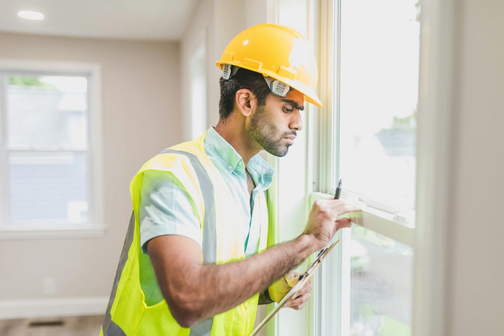 Final checks after property renovation.
Photo by RDNE Stock project: https://www.pexels.com/photo/construction-worker-in-yellow-safety-vest-and-helmet-checking-glass-window-of-a-house-8293699/